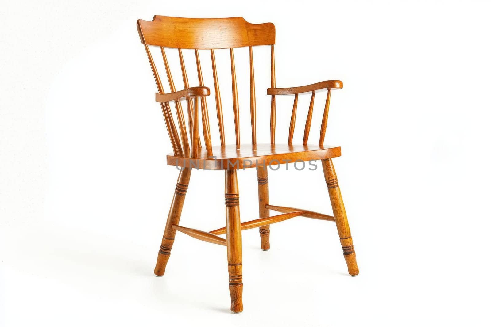 A well-crafted wooden chair featuring a spindle backrest and sturdy legs stands against a bright background, showcasing its craftsmanship.