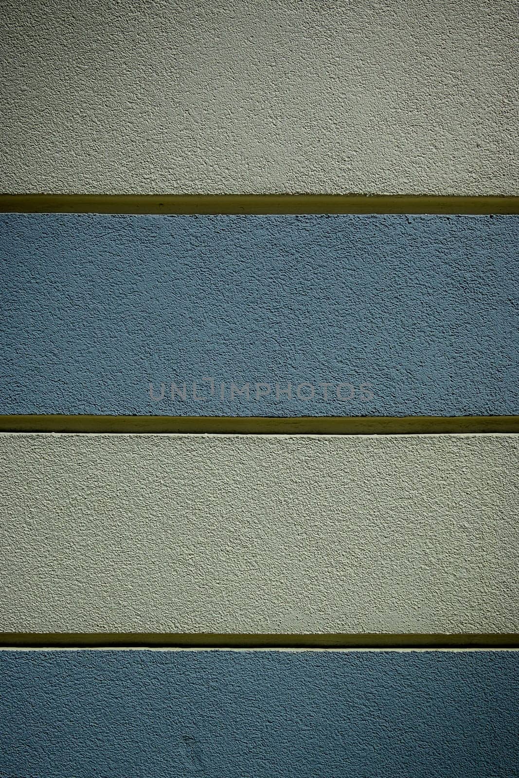 Striking colors and textures blend harmoniously on a contemporary wall, capturing the essence of modern design.