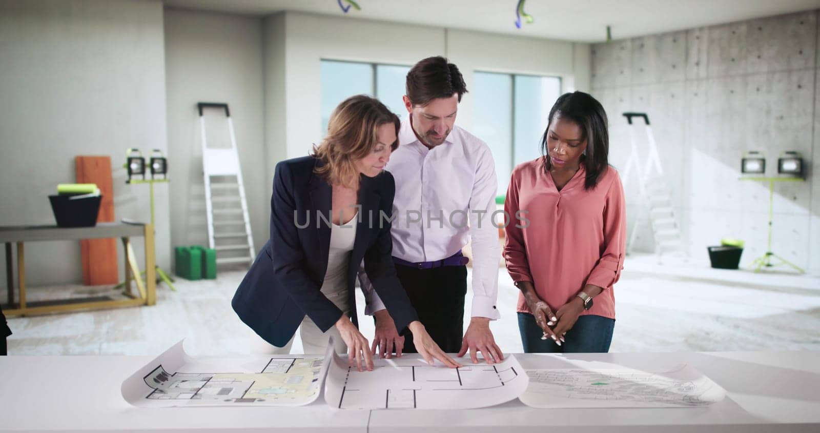 Young Couple Seeking Advice From Realtor in Buying First Home