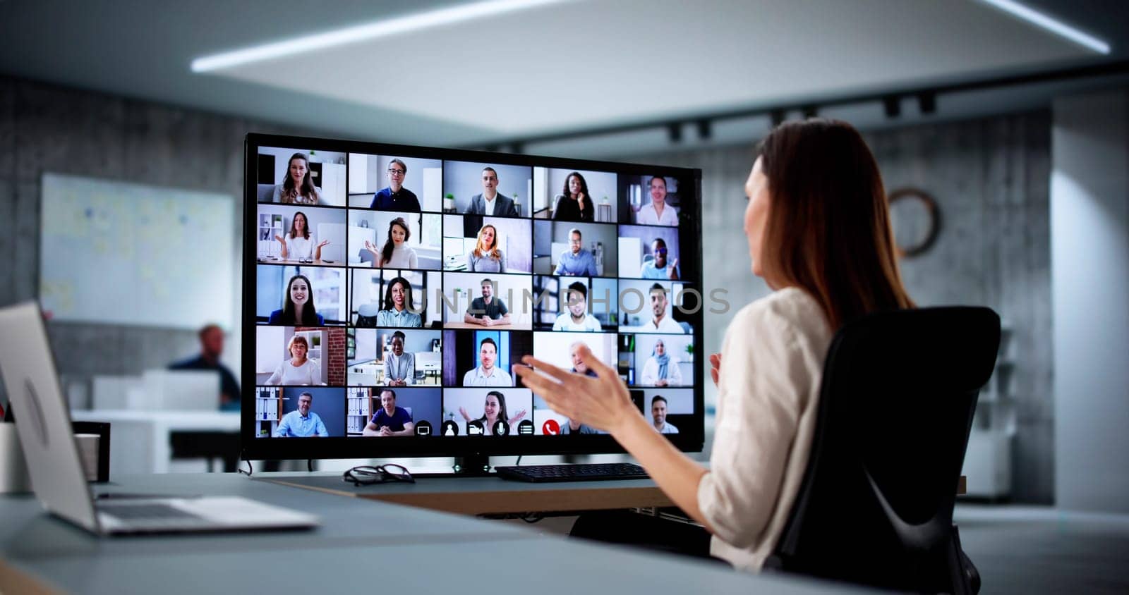 Female HR professional conducting online video conference on remote mountain