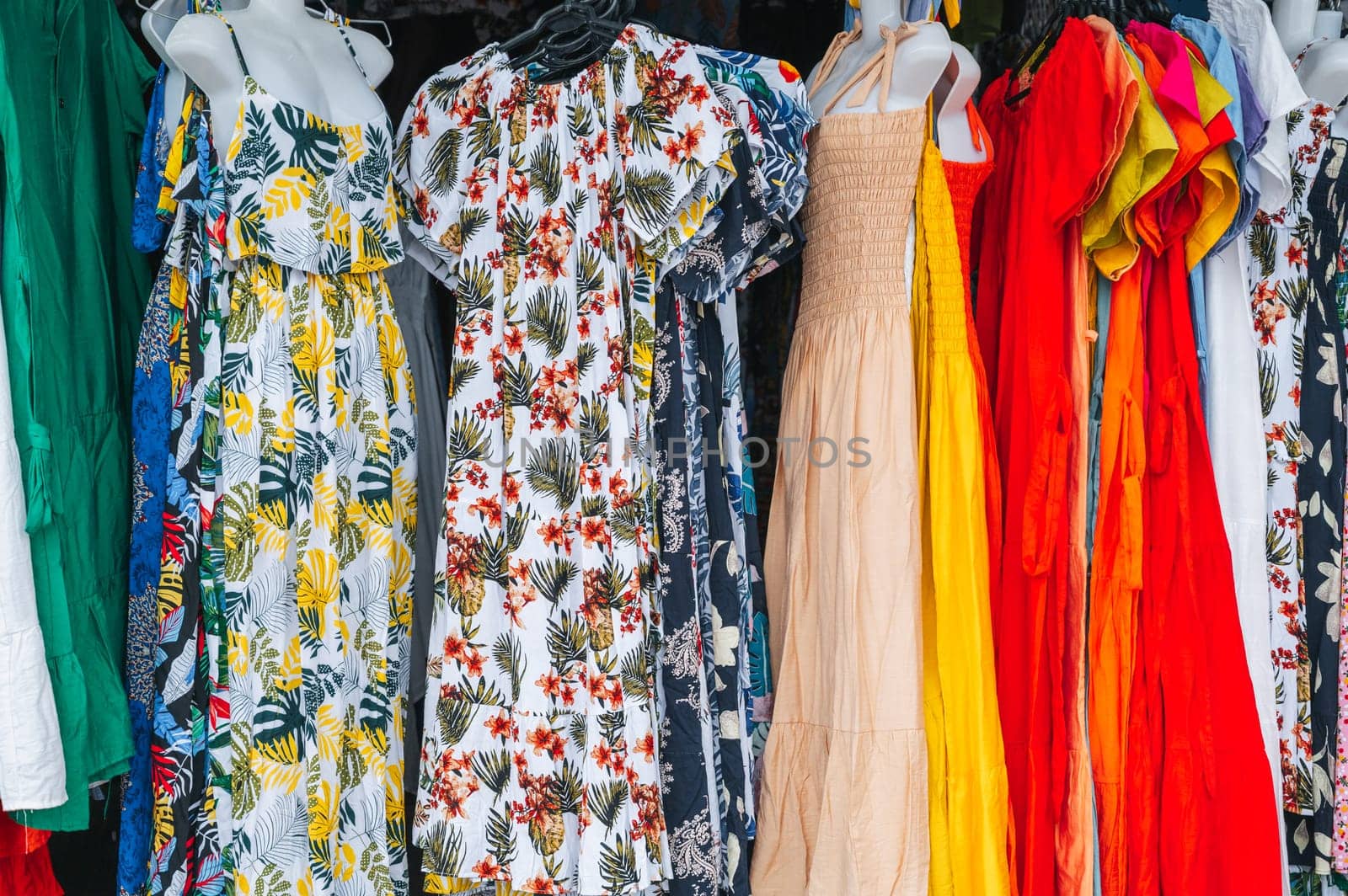 women's multicolored dresses at the East Asian street market