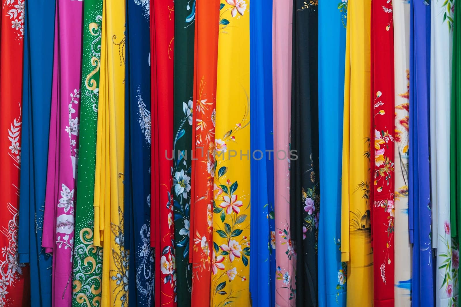 colorful silk scarves at the Asian textile market in Vietnam close-up