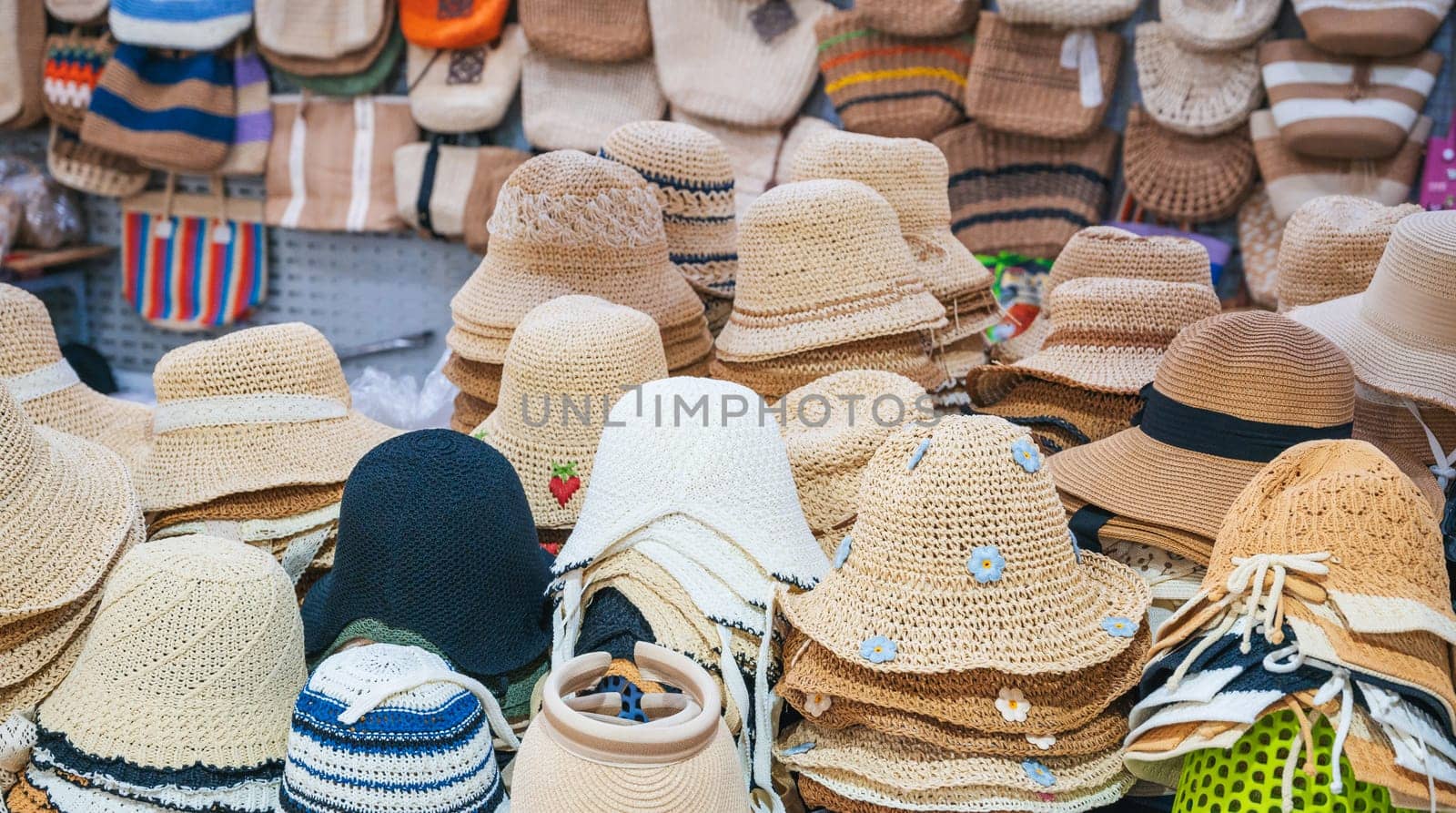summer beach hats for women woven from bamboo on the Asian market in Vietnam