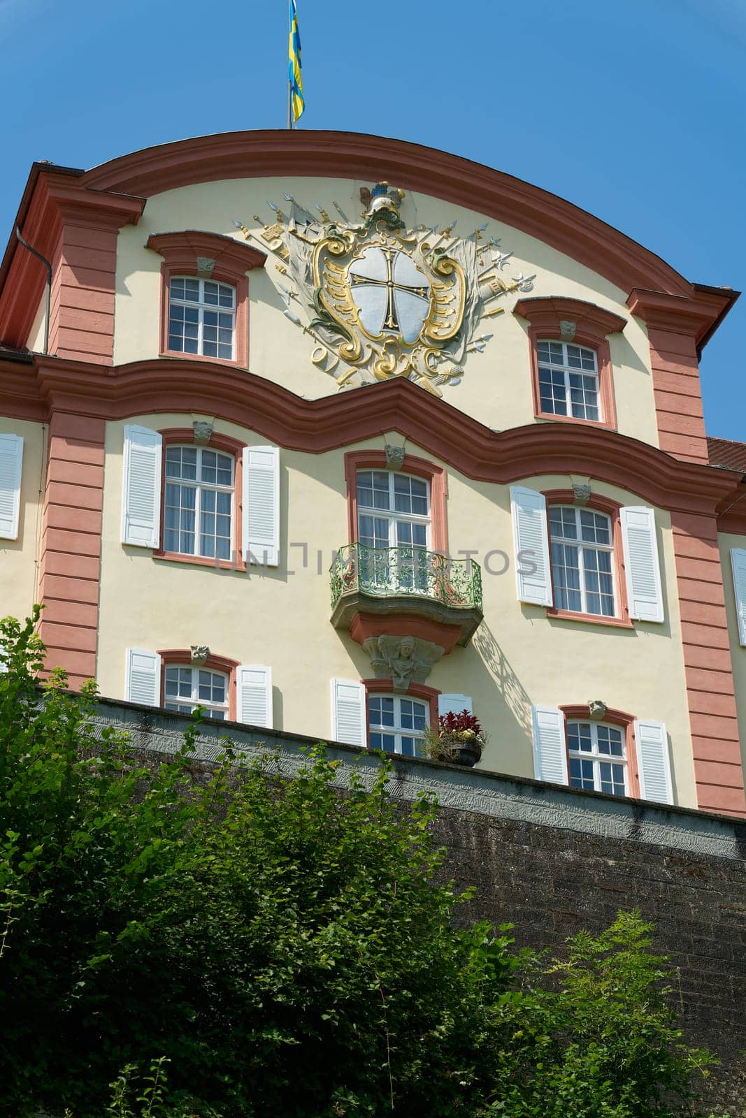 Mainau Island, Germany – July 31, 2024: Detail of the baroque palace on Mainau Island, now owned by the Lennart Bernadotte Foundation, seen from the lake