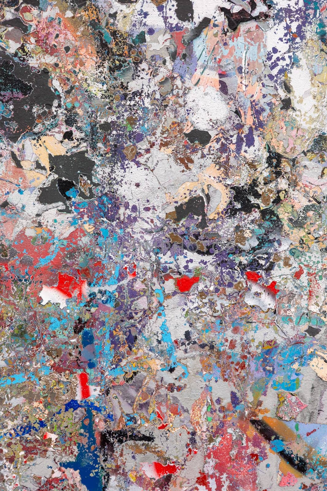 A dynamic abstract painting featuring a textured surface with vibrant splashes of blue, red, purple, and metallic tones. Perfect for backgrounds, modern decor, or artistic projects