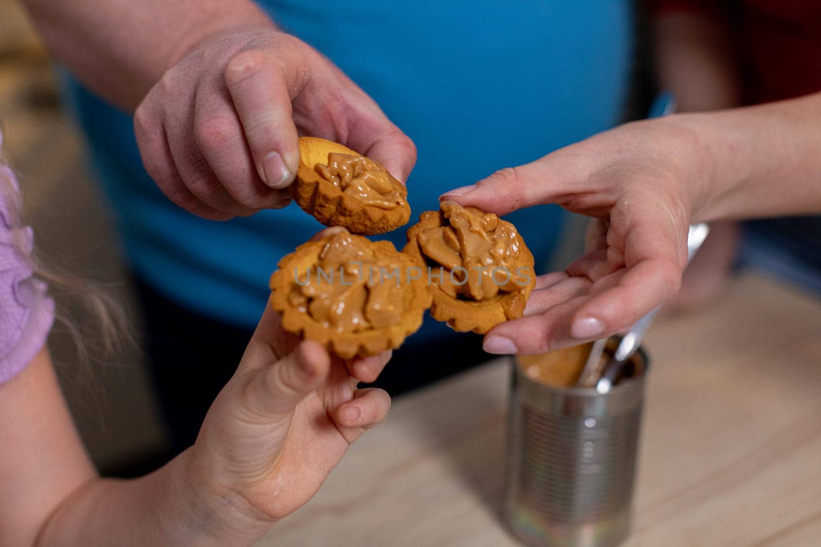 Families creating strong bonds over delicious homemade cookies, capturing joy, love and togetherness in the kitchen