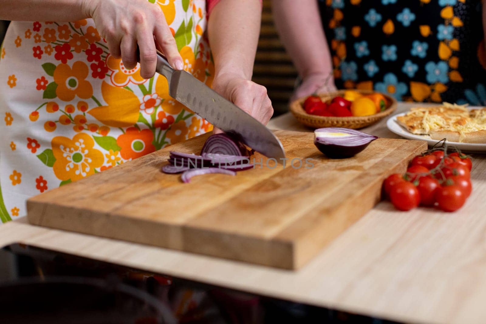 A vibrant scene showing the preparation of healthy food with colorful vegetables being expertly sliced