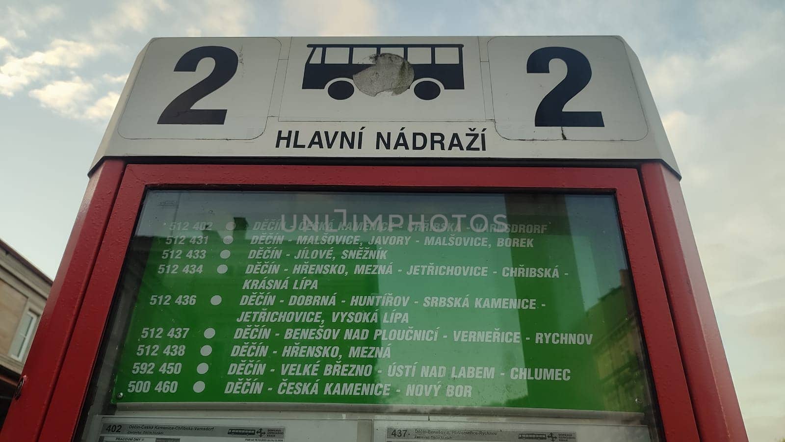 October 16 2024 Decin Czech Republic Europe . Bus stop schedule travel transport station city centre town sign . High quality photo