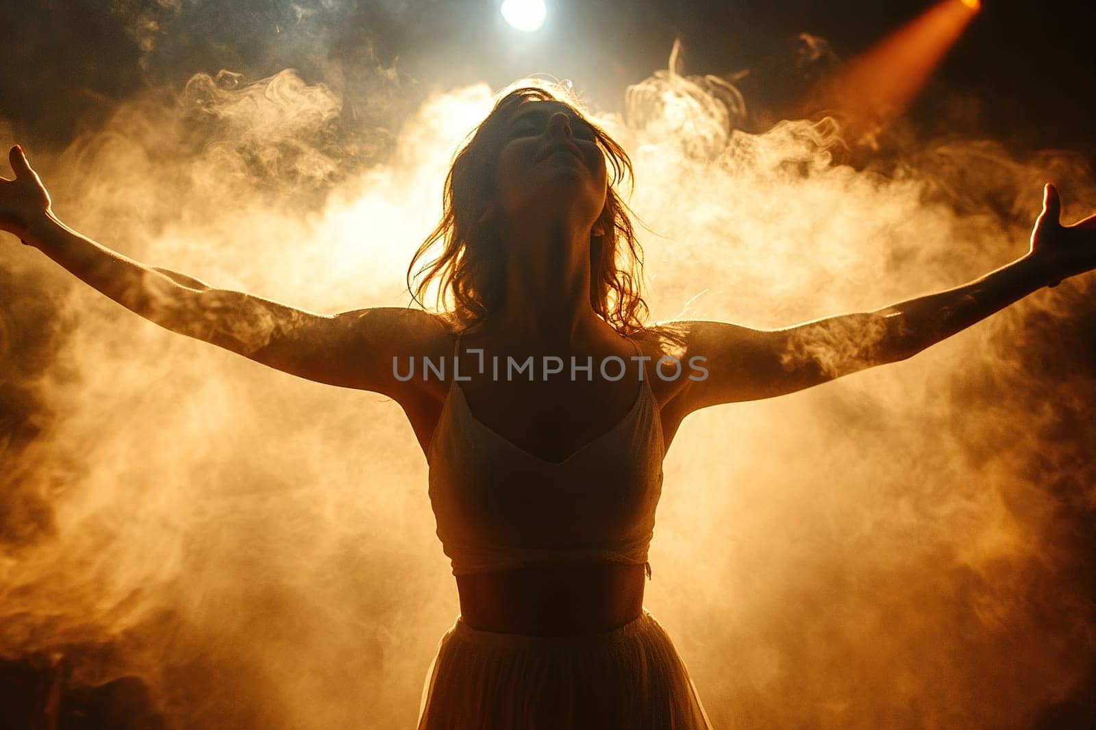 Silhouette of woman feeling joy in the clubs of light smoke