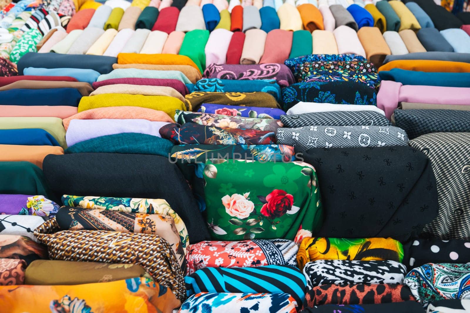 clothing and fabrics at textile market bazaar in Asia in Vietnam