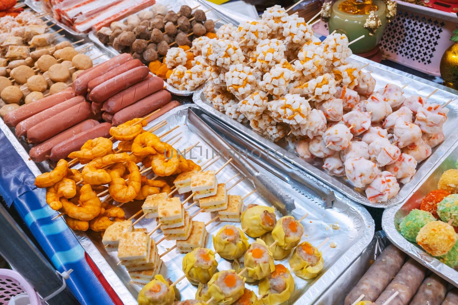 Fast food at the Asian night market in Asia. Traditional Vietnamese street food on the counter in Vietnam in Da Nang