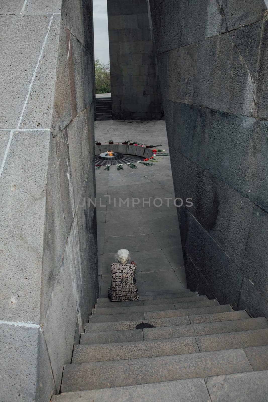 Armenia, Yerevan, April 2023 A woman in a memorial complex to the victims of the Armenian Genocide