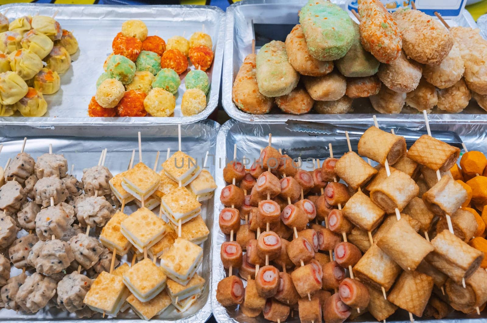 Fast food at Asian night market in Asia. Traditional Vietnamese street food on counter in Vietnam in Da Nang