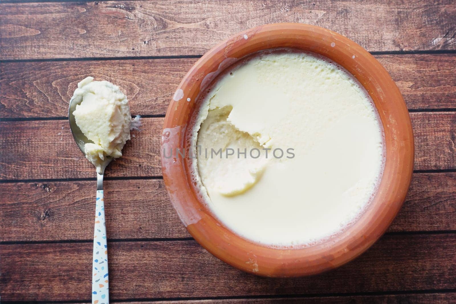 Experience the delight of freshly made yogurt being served at a local eatery.