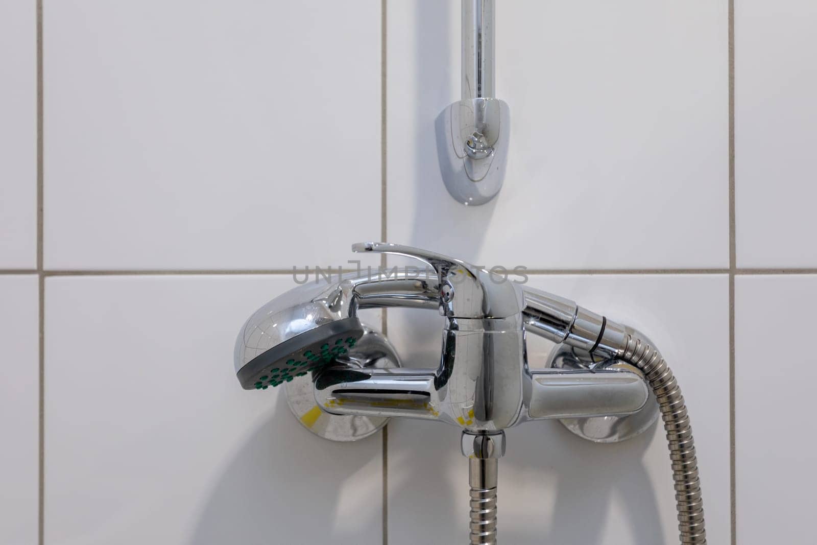 This stylish shower mixer has a sleek chrome finish and a wallmounted design, ideal for modern bathrooms