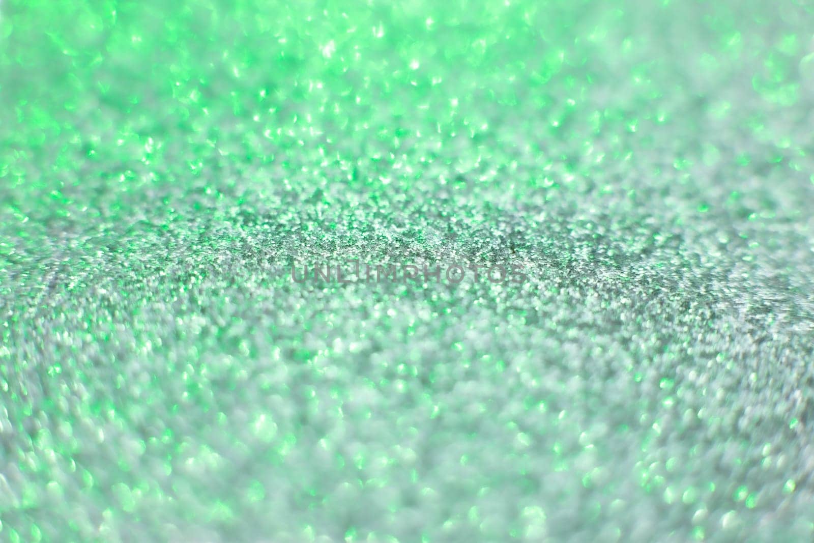 Beautiful green decorative abstract blurred christmas background. Copy space