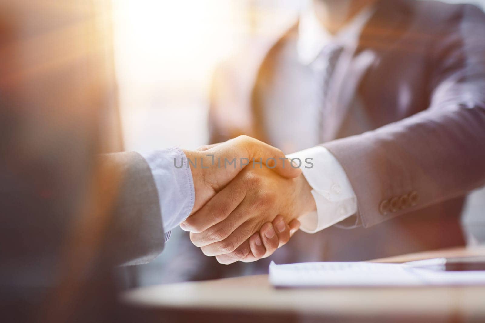 Close up of handshake in the office