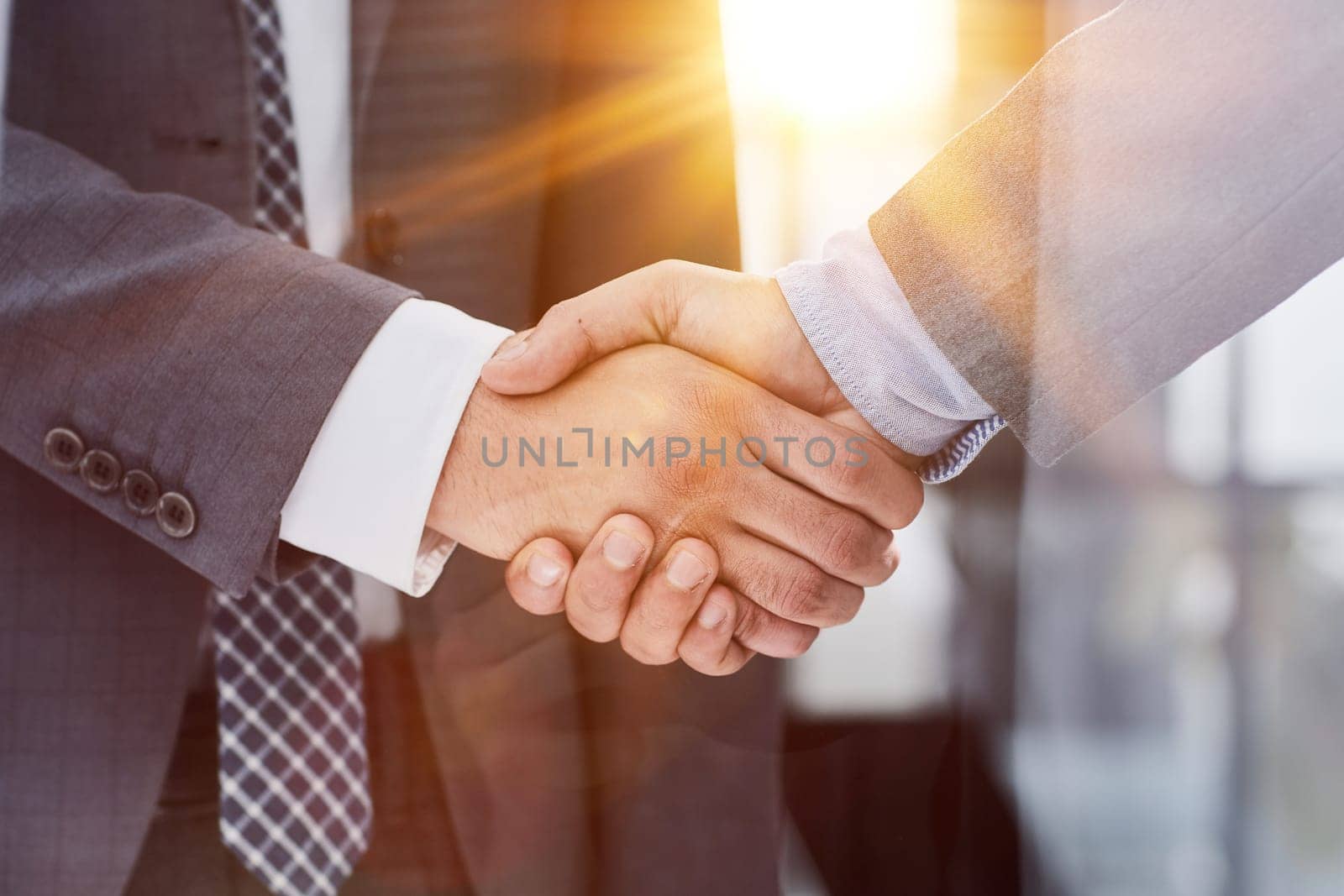 Close up of handshake in the office