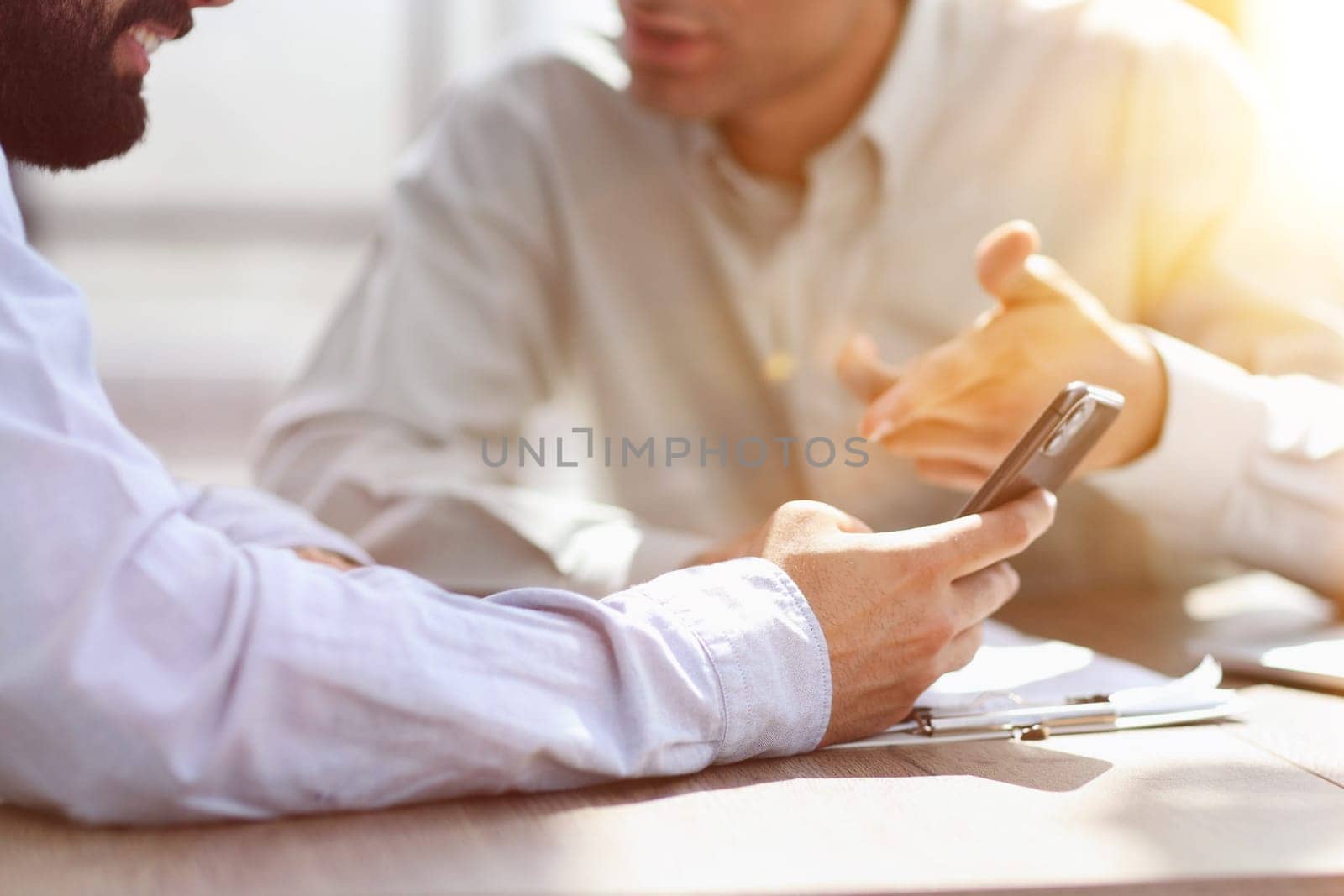 man working on the table with laptop in a new office