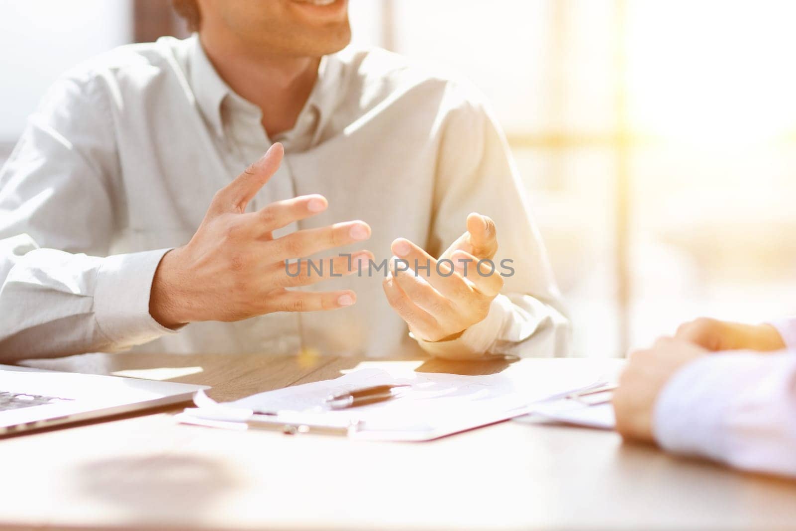 man working on the table with laptop in a new office