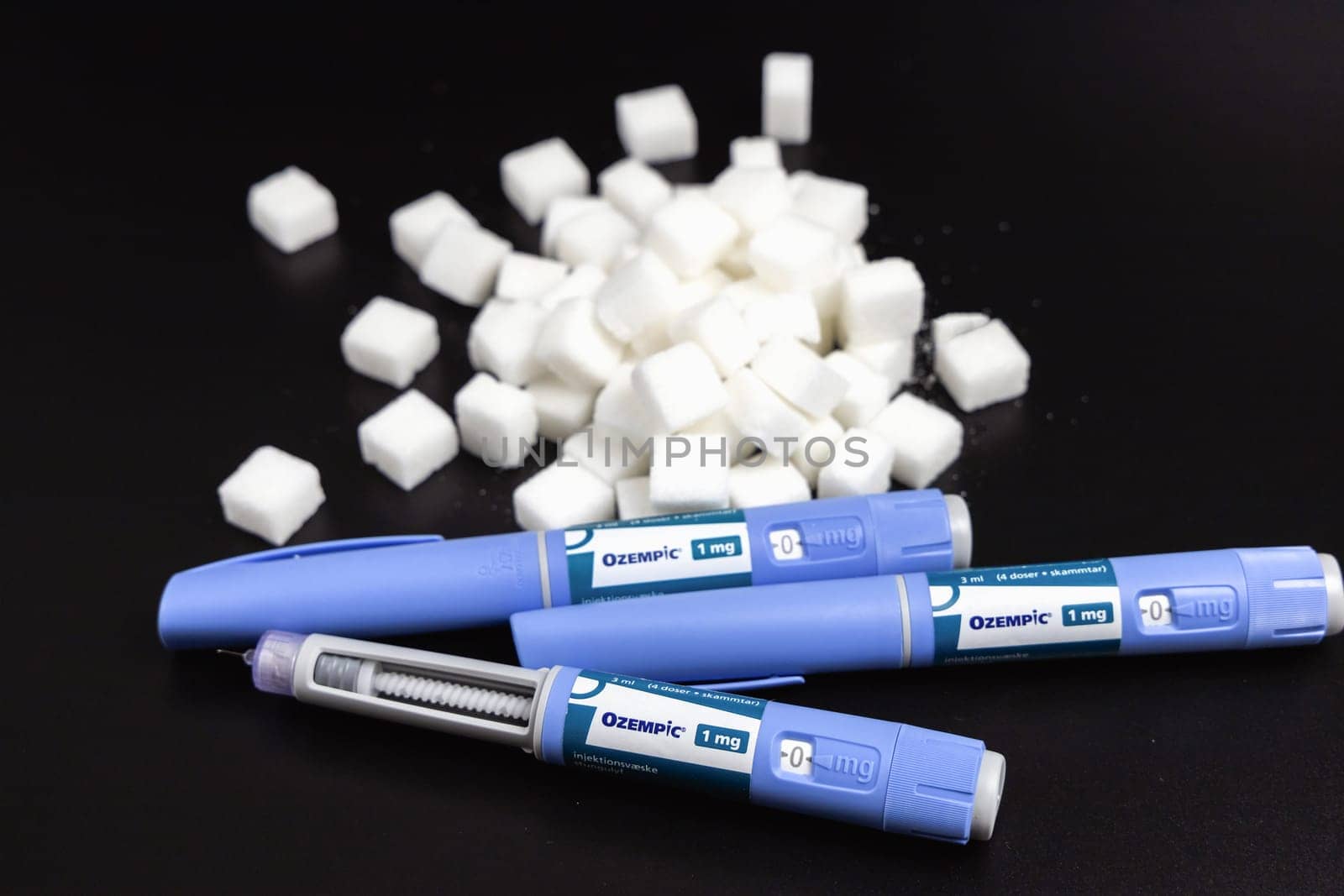 Ozempic Insulin injection pen on a dark background for diabetics and weight loss. Copenhagen, Denmark - February 16, 2025
