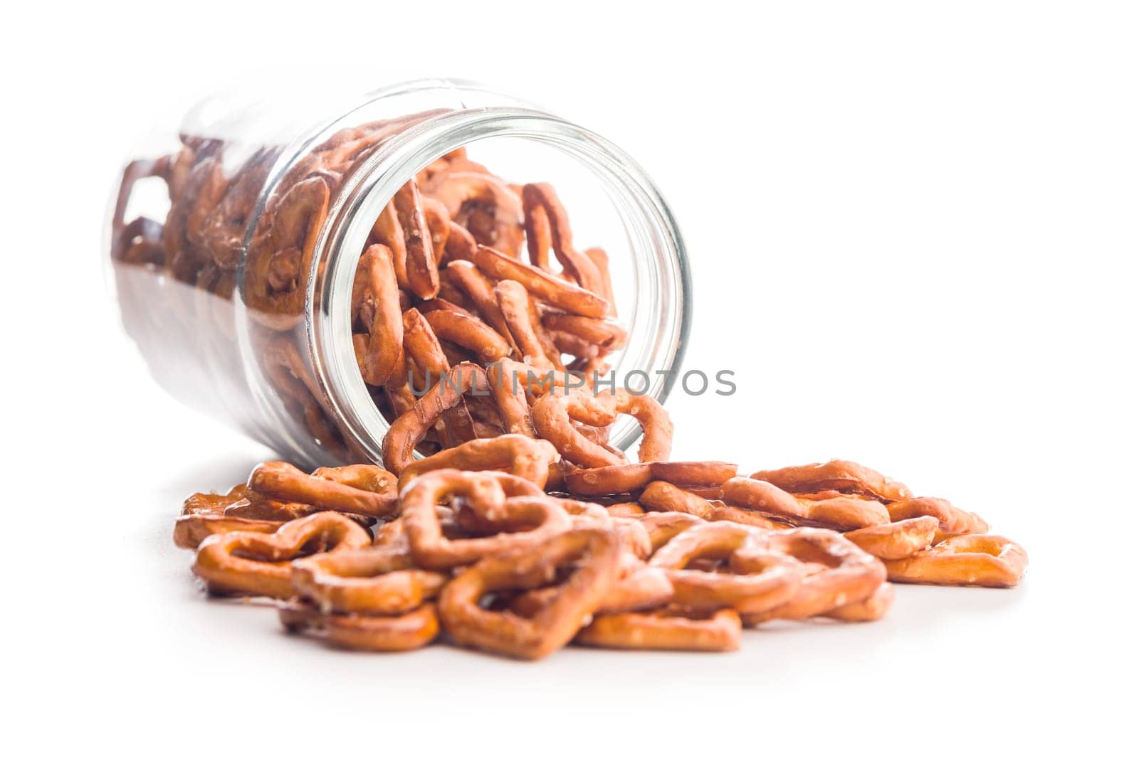 Heart shaped pretzel in jar isolated on a white background.