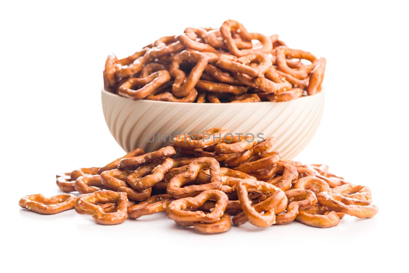 Heart shaped pretzel in bowl  isolated on a white background.