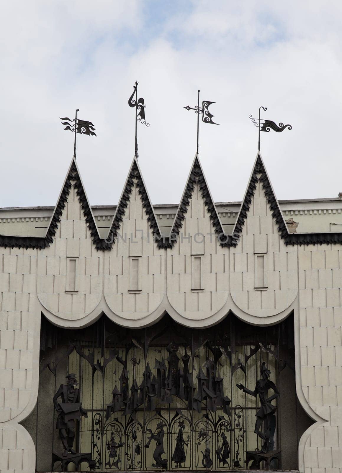 Nizhny Novgorod, Russia - August 27, 2016 - Ornate roof features with decorative sculptures of an Academic Puppet Theater