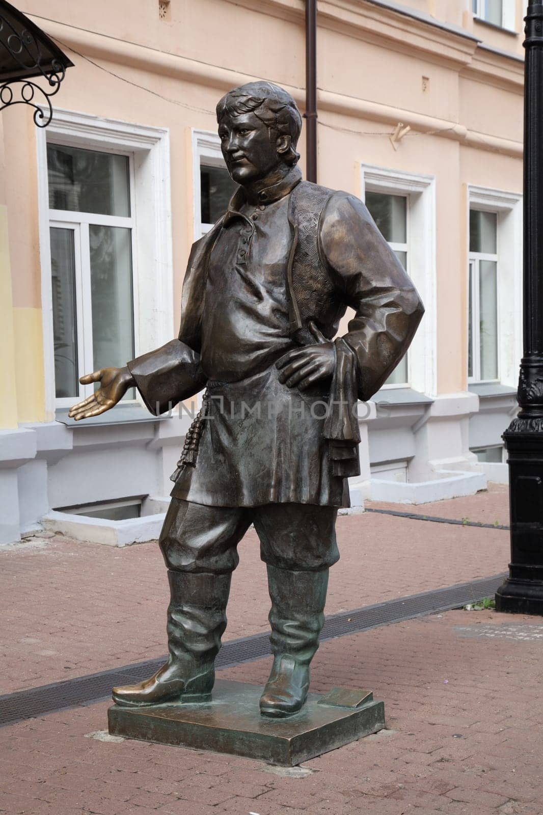 Nizhny Novgorod, Russia - August 27, 2016 - Street sculpture of a polovoy, servant in a hostel, with traditional attire