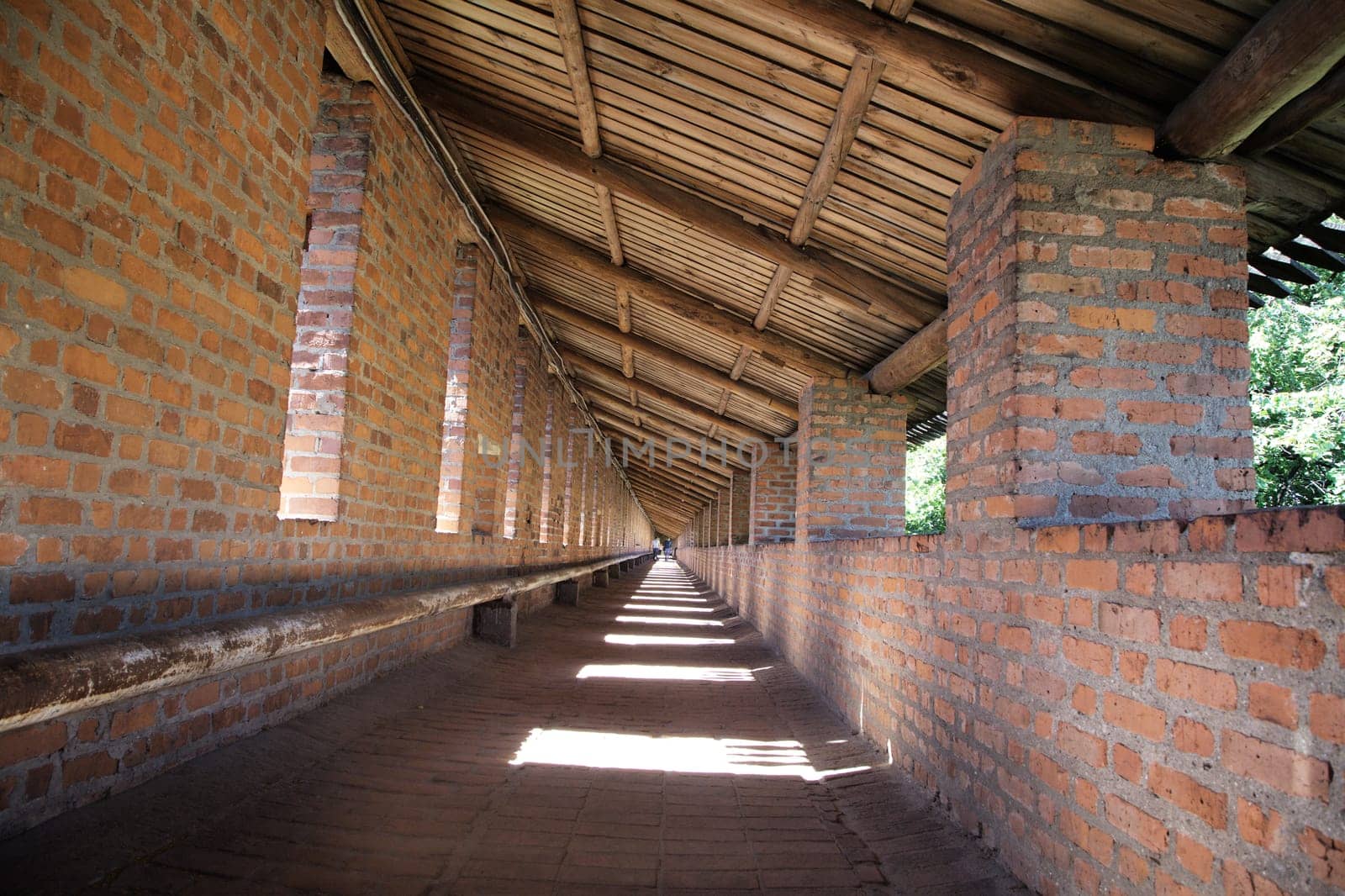 Long corridor of brick and wooden structure in kremlin of Nizhny Novgorod, Russia