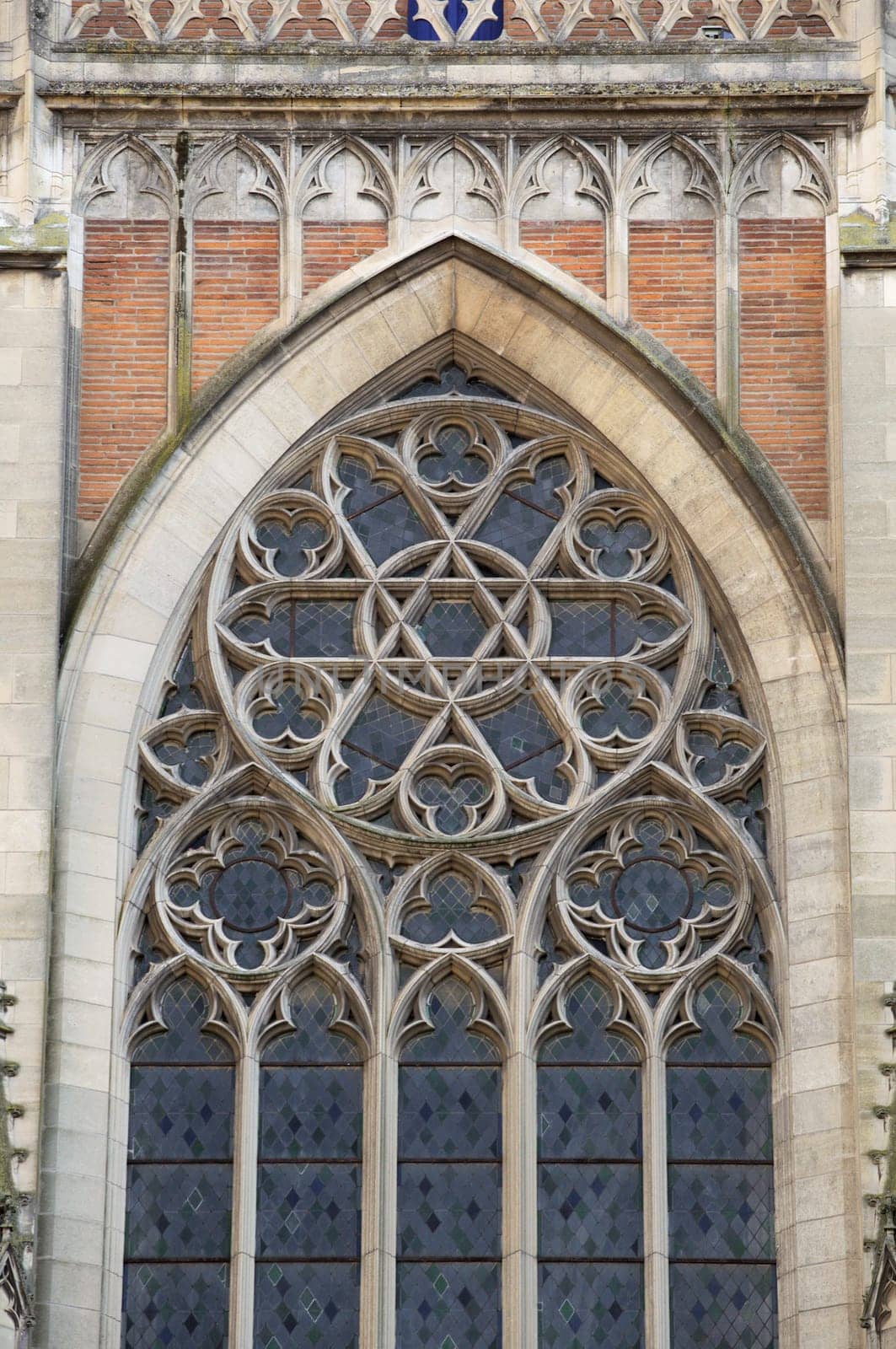 Ornamented window of a cathedral in gothic style