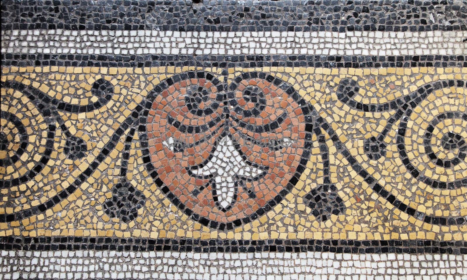 The floor of Sainte-Secile cathedral features intricate mosaics, showcasing Albi's historical craftsmanship.