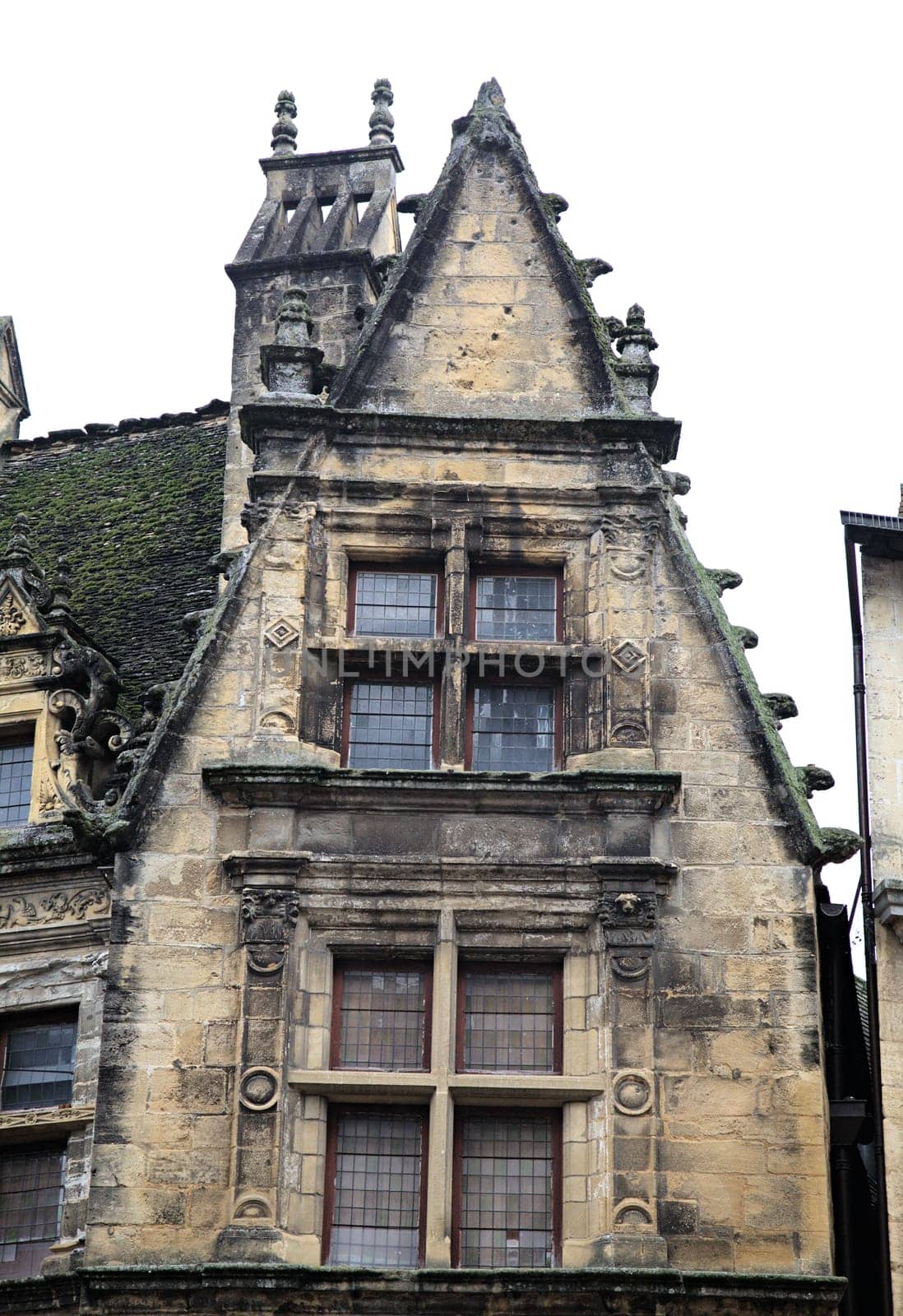 Details of a historic Maison de la Boetie in Sarlat-la-Caneda showcase the architectural heritage of this French commune.