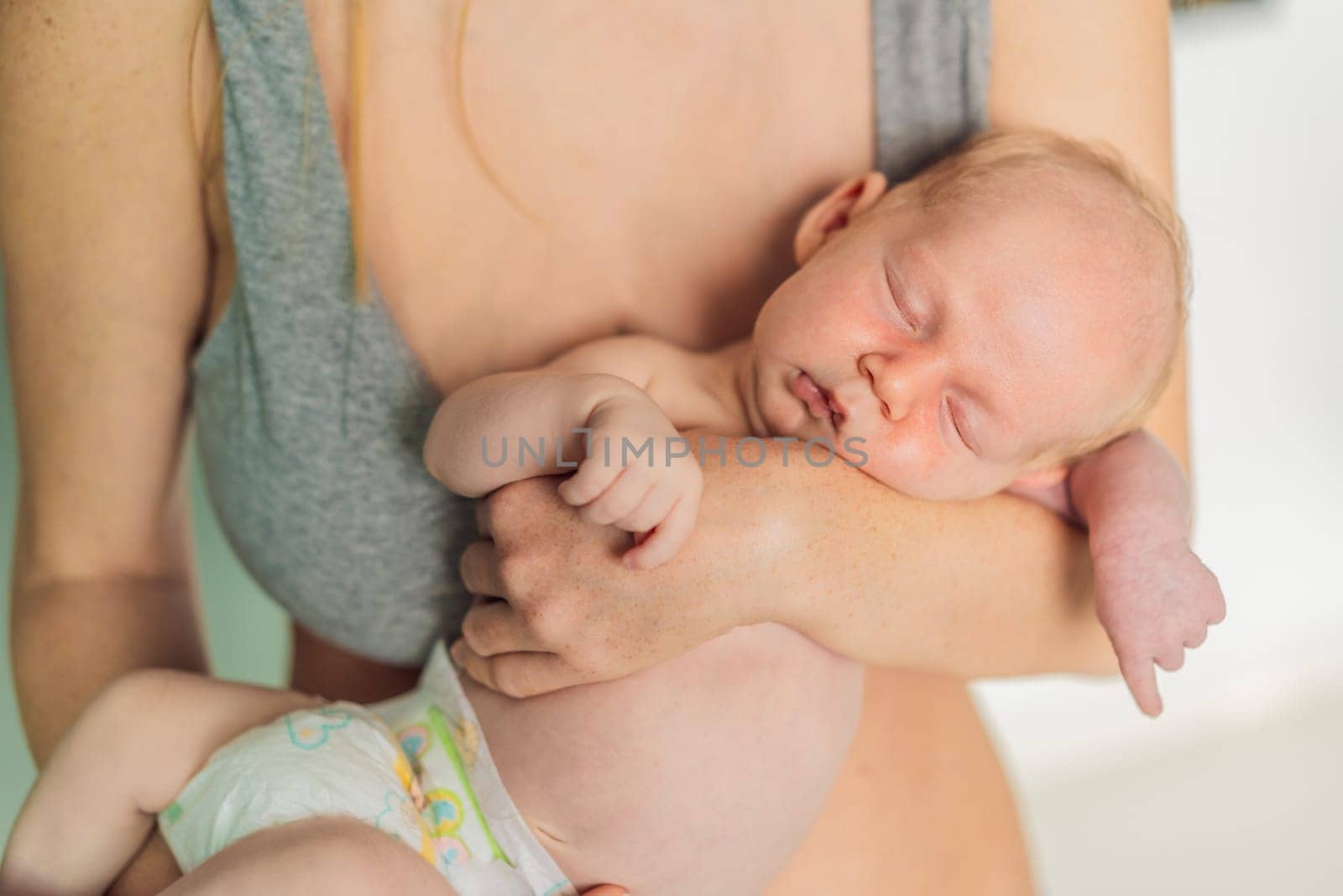 A mother lovingly embraces her newborn baby, holding them close to her chest. A tender moment of warmth, security, and deep maternal love, symbolizing bonding, comfort, and the unbreakable connection between mother and child.