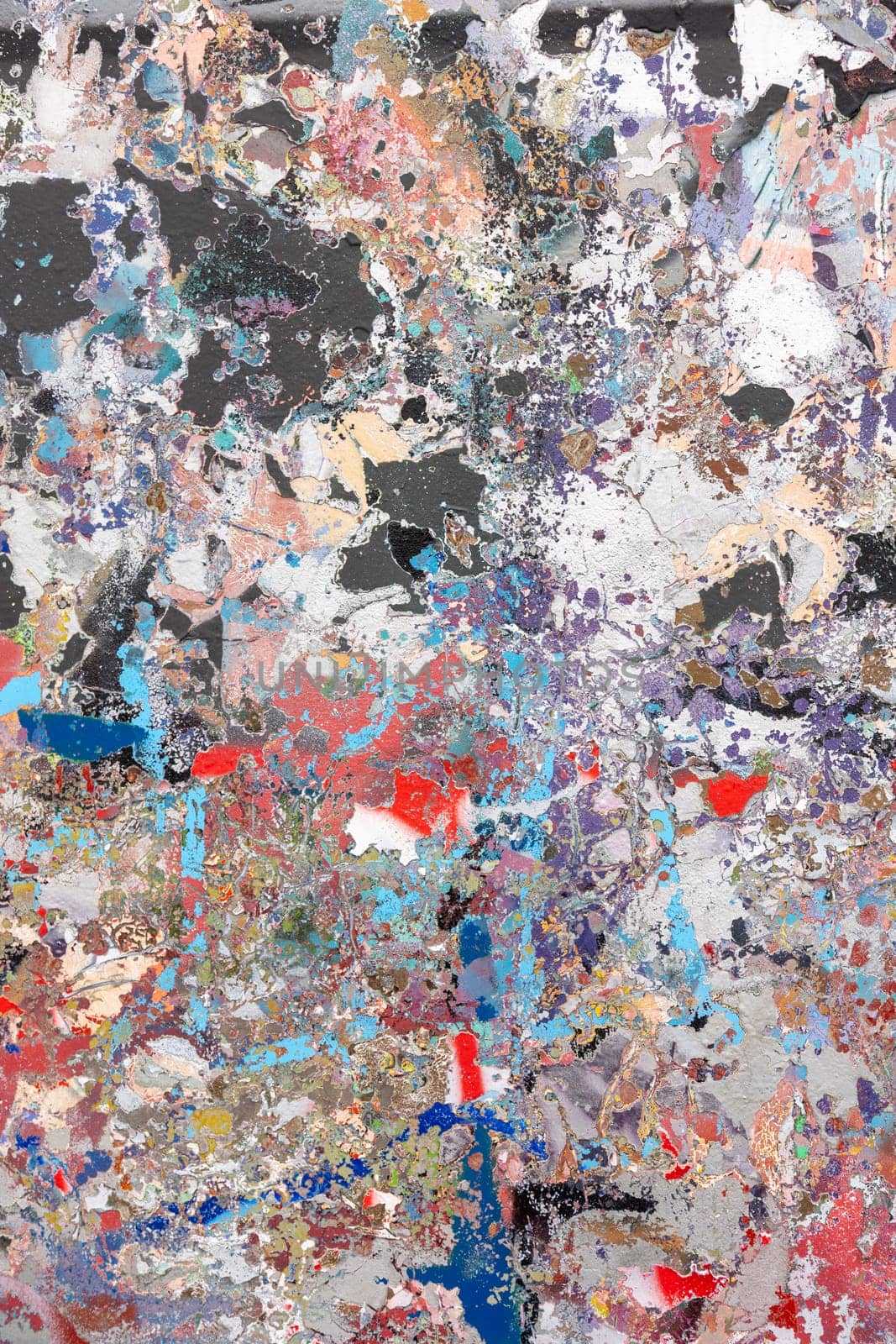 Vibrant abstract textured painting with peeling paint and expressive color splashes. An artistic composition ideal for backgrounds, modern designs, and creative concepts.