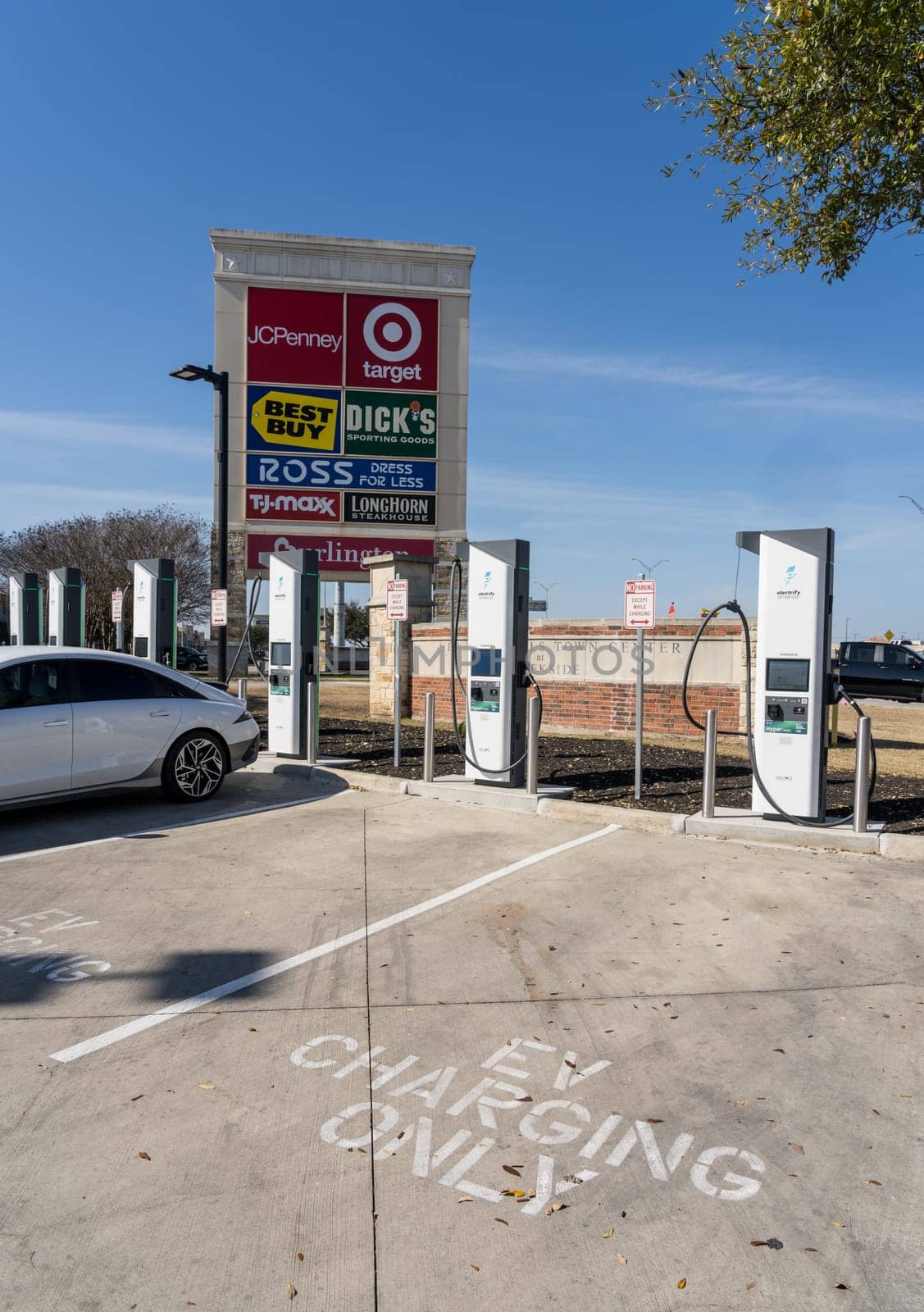 New Braunfels, TX - 1 March 2025: Hyundai Ioniq 6 being charged at Electrify America Hyperfast 350KW charging station in Texas