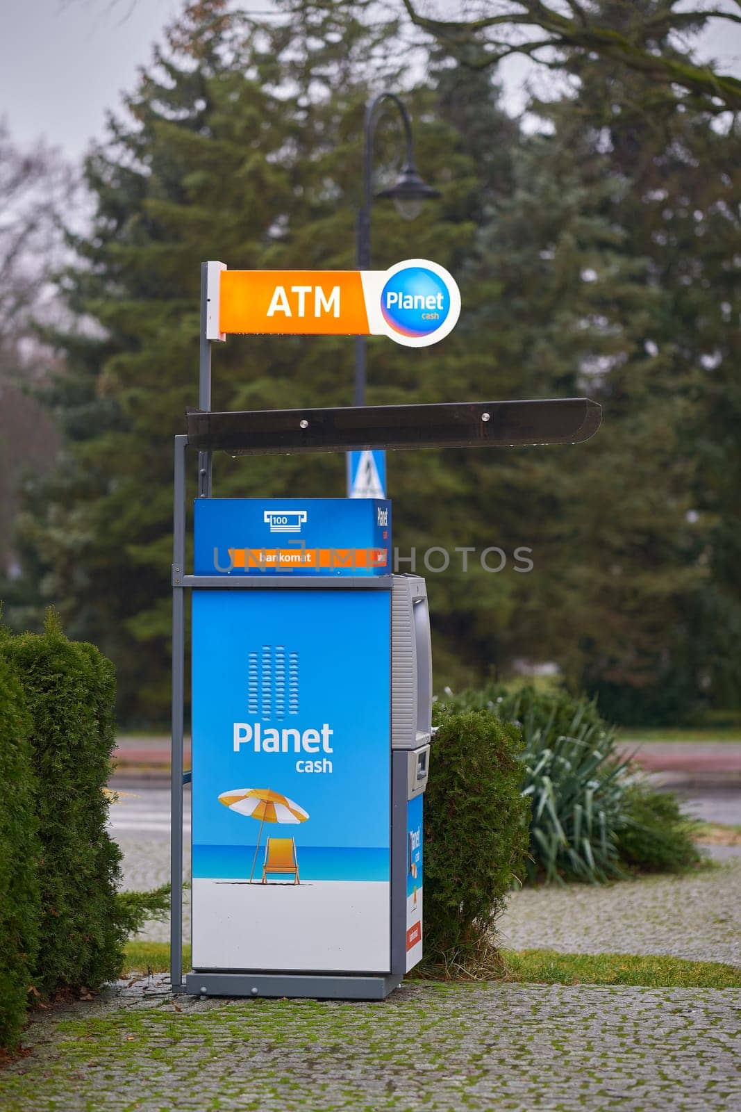 Swinoujscie, Poland – December 26, 2024: ATM cash machine for tourists on the roadside in Swinoujscie in Poland
