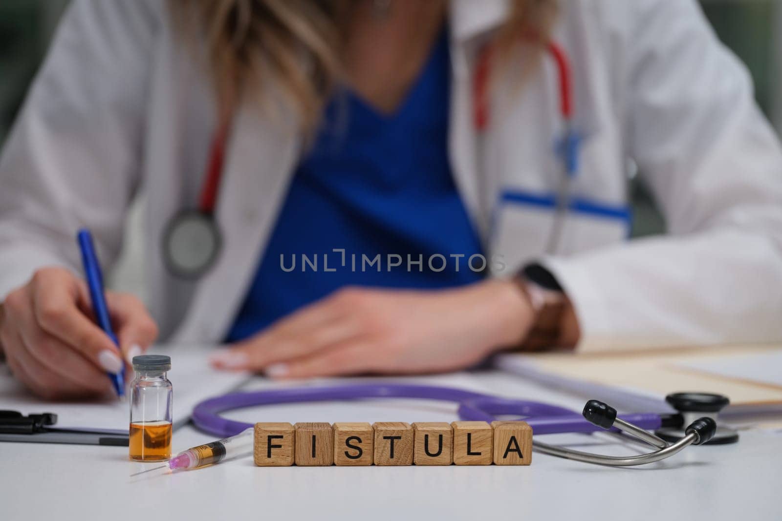 A healthcare professional specializing in fistula treatment, equipped with necessary tools and documentation