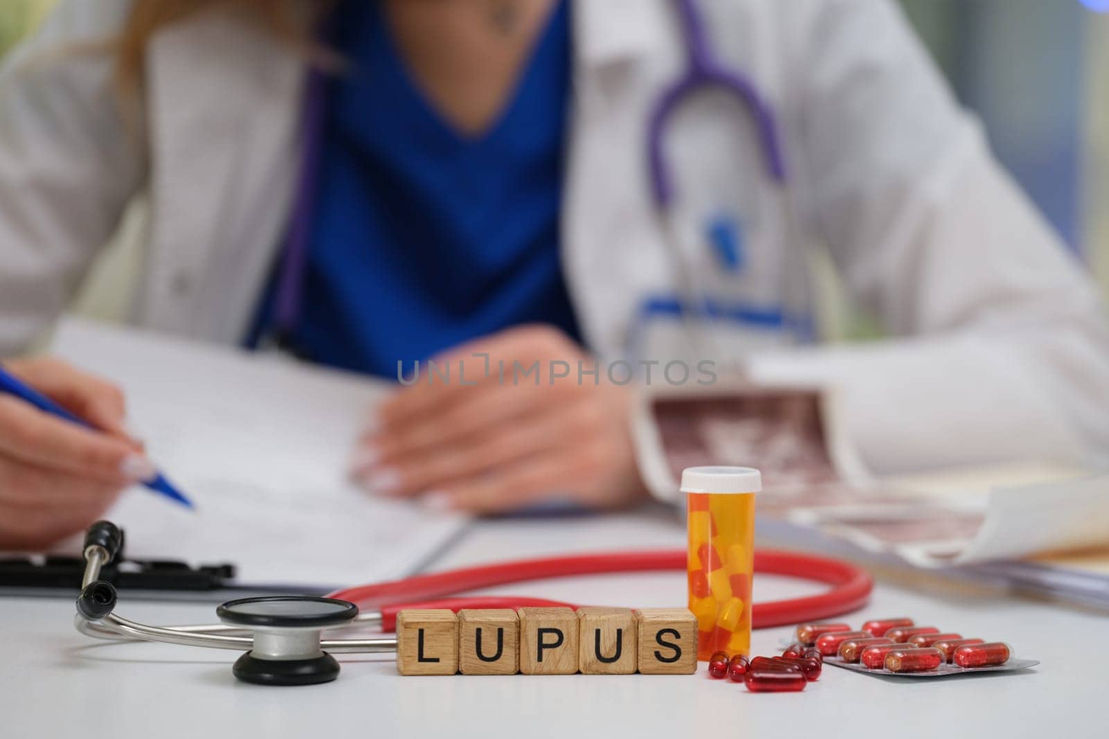 A dedicated healthcare professional thoroughly reviews lupus treatment options, utilizing medication and a stethoscope