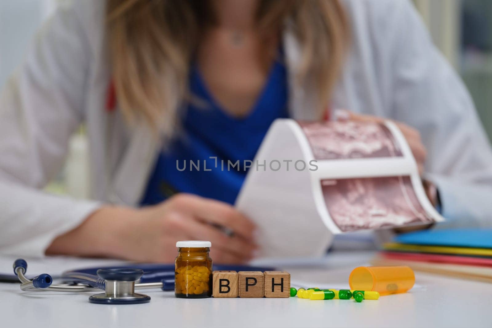 A dedicated and focused medical professional carefully reviewing a patients detailed information regarding BPH