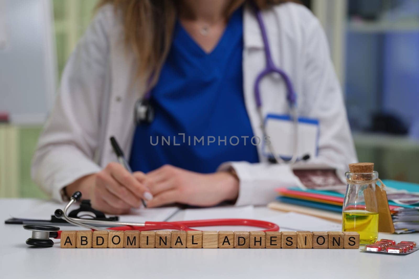 A medical professional studies abdominal adhesions, highlighting their importance in effective healthcare