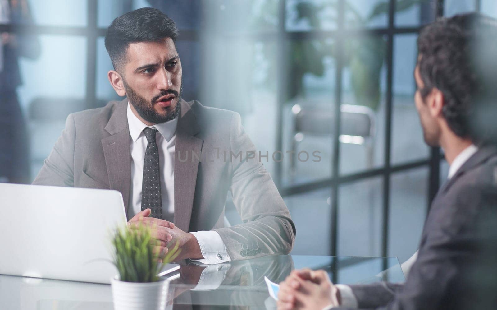Contract, meeting or financial advisor with a man employee at work in collaboration