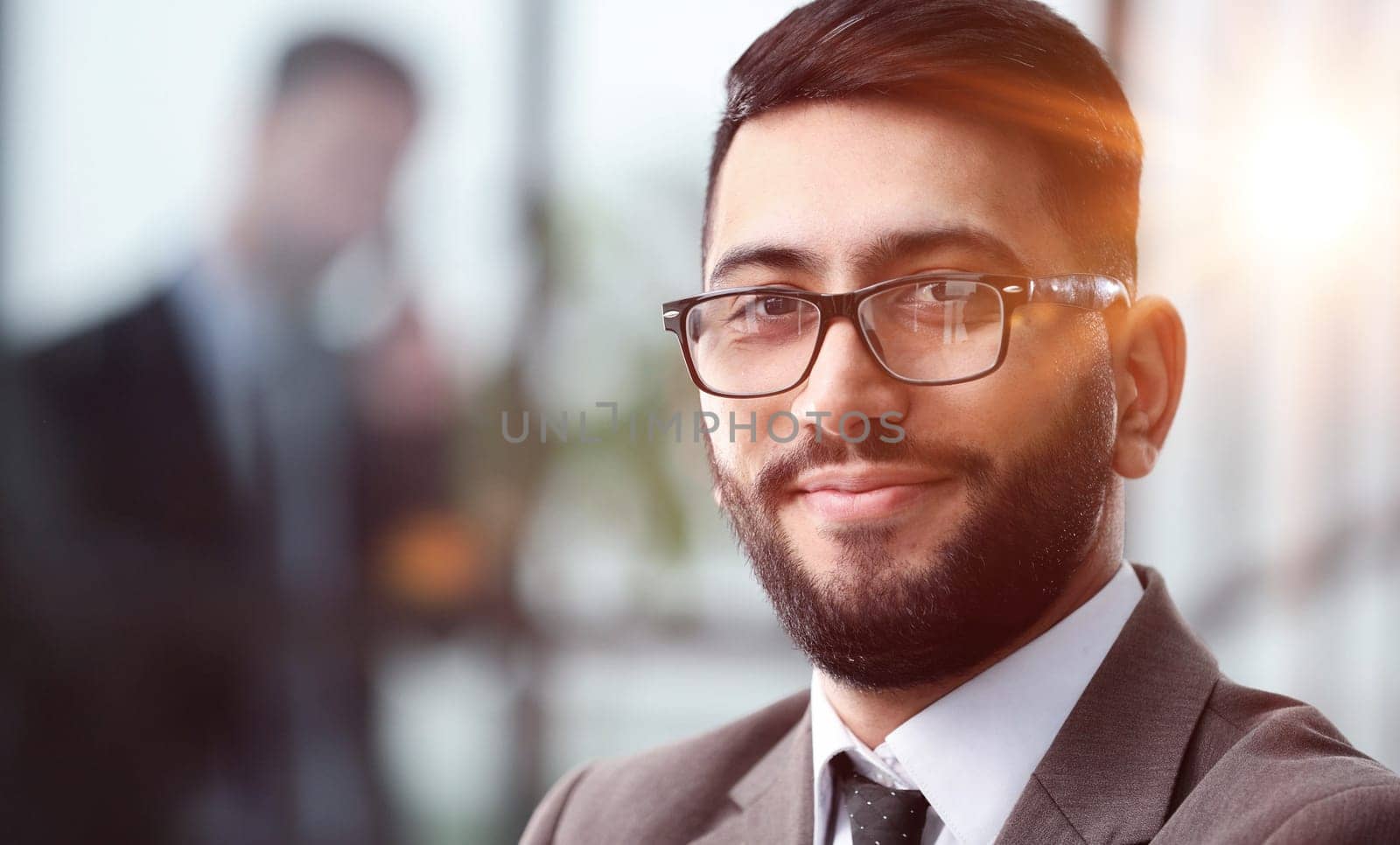 Close-up portrait of a dedicated young businessman