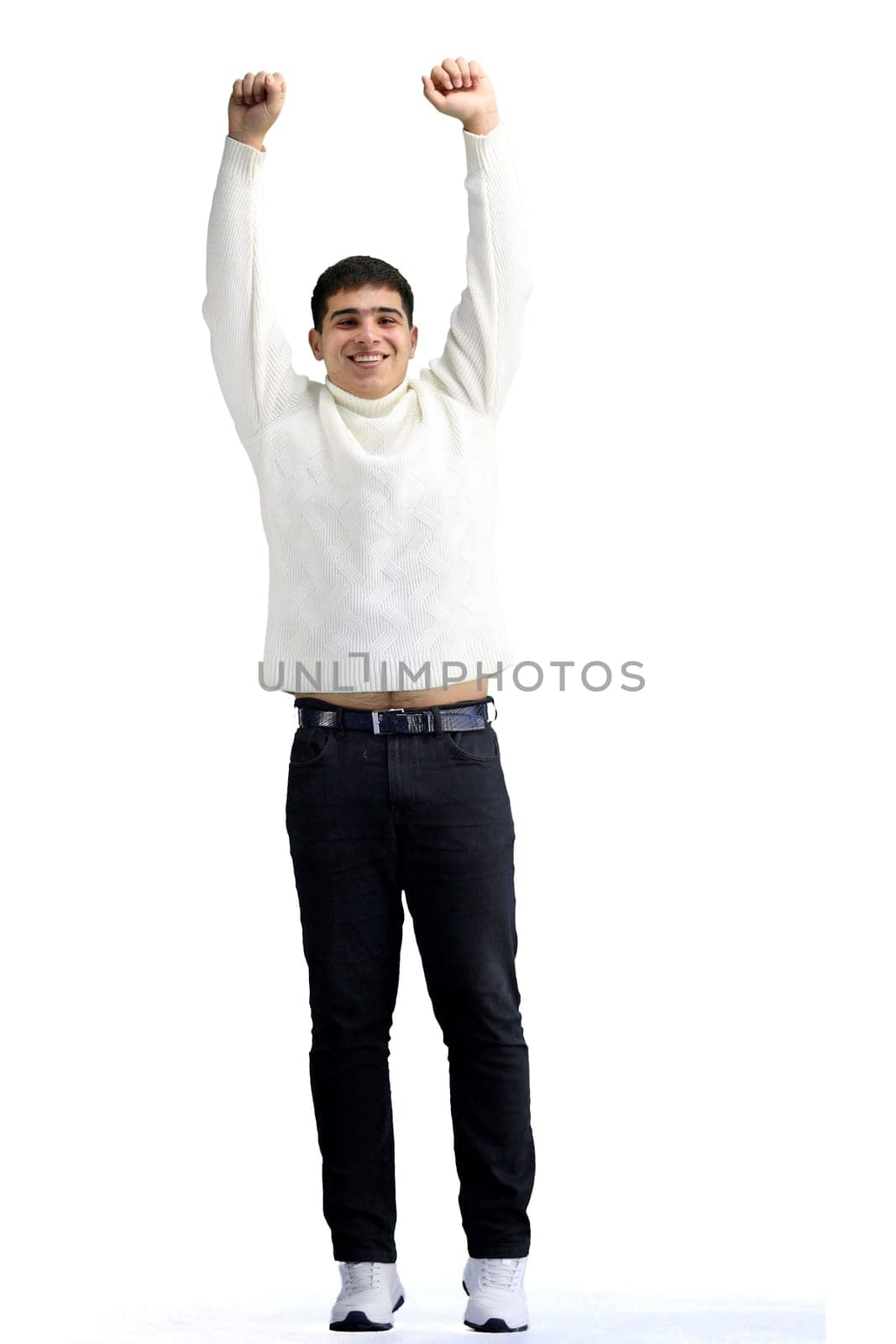 A man, full-length, on a white background, raised his hands up.