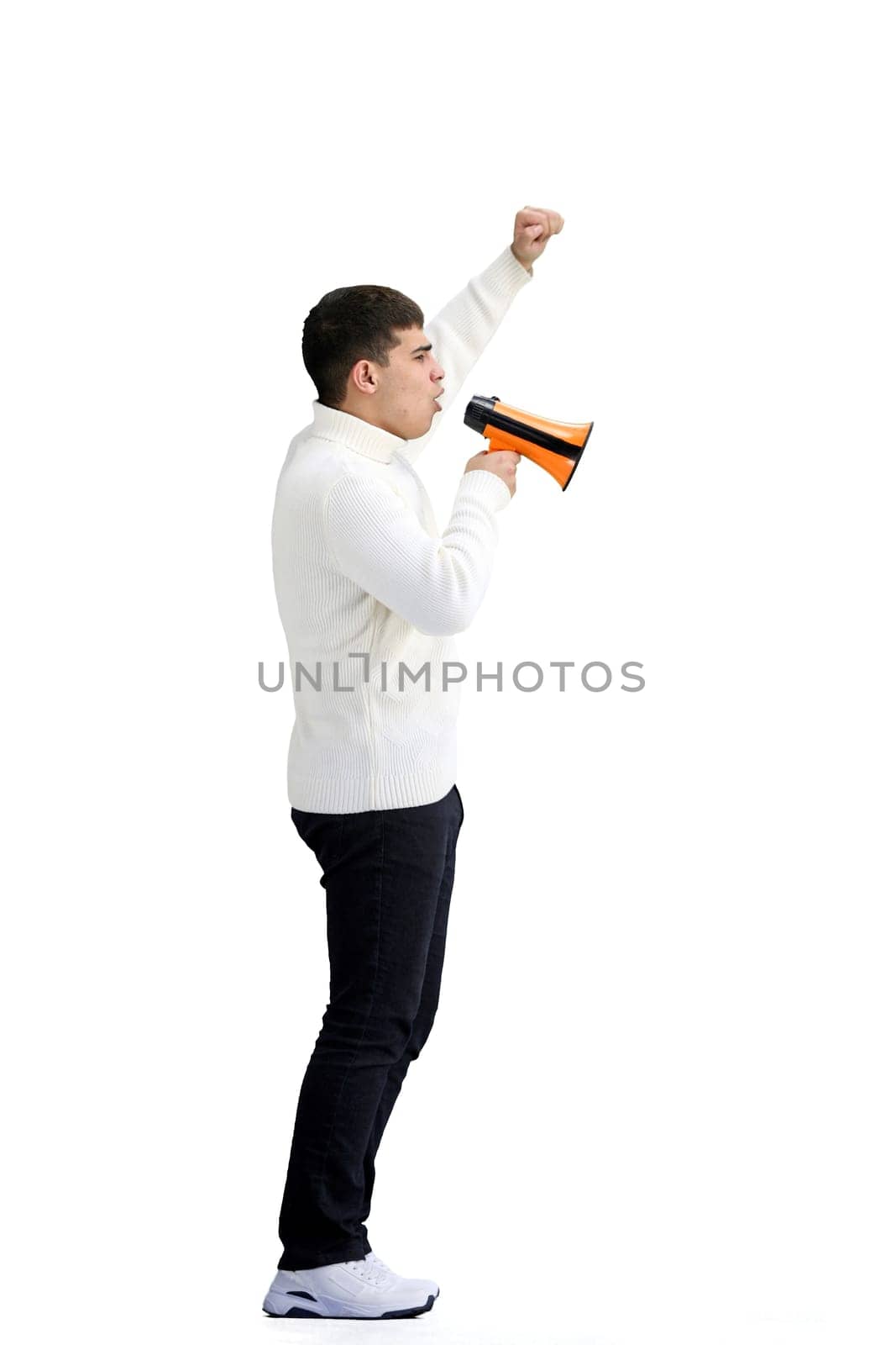 A man, full-length, on a white background, with a megaphone.