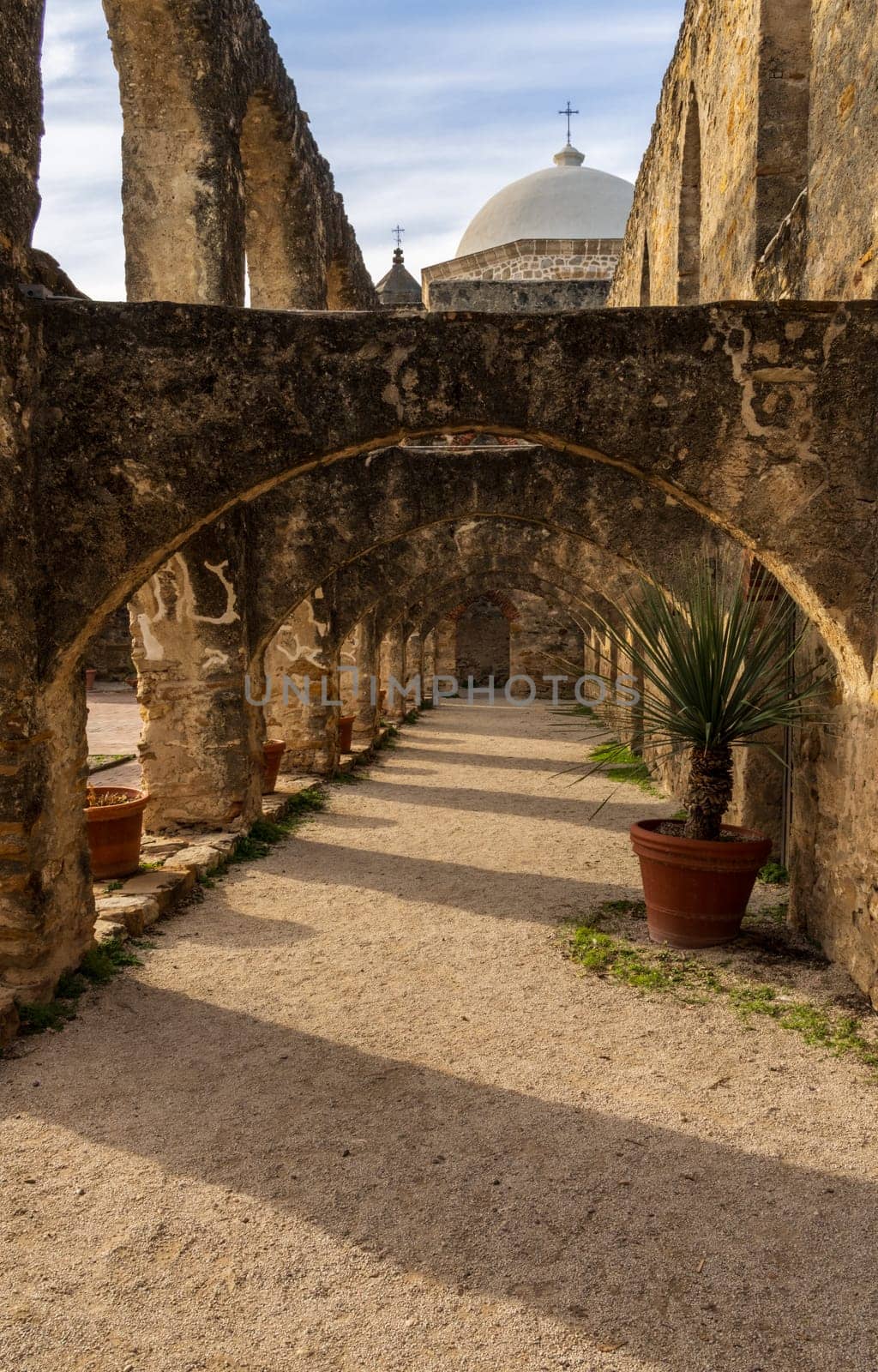 Repeating patterns of the roof supporting arches in Mission San Jose church near San Antonio, Texas
