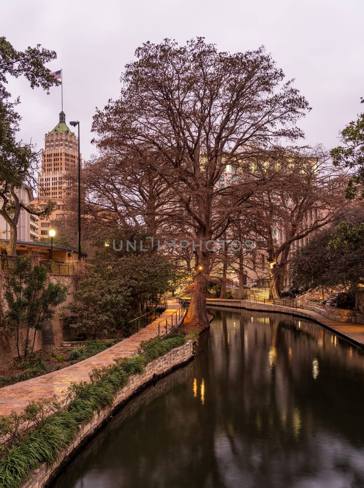 Empty walkways at dawn in long exposure image of River Walk in San Antonio, Texas