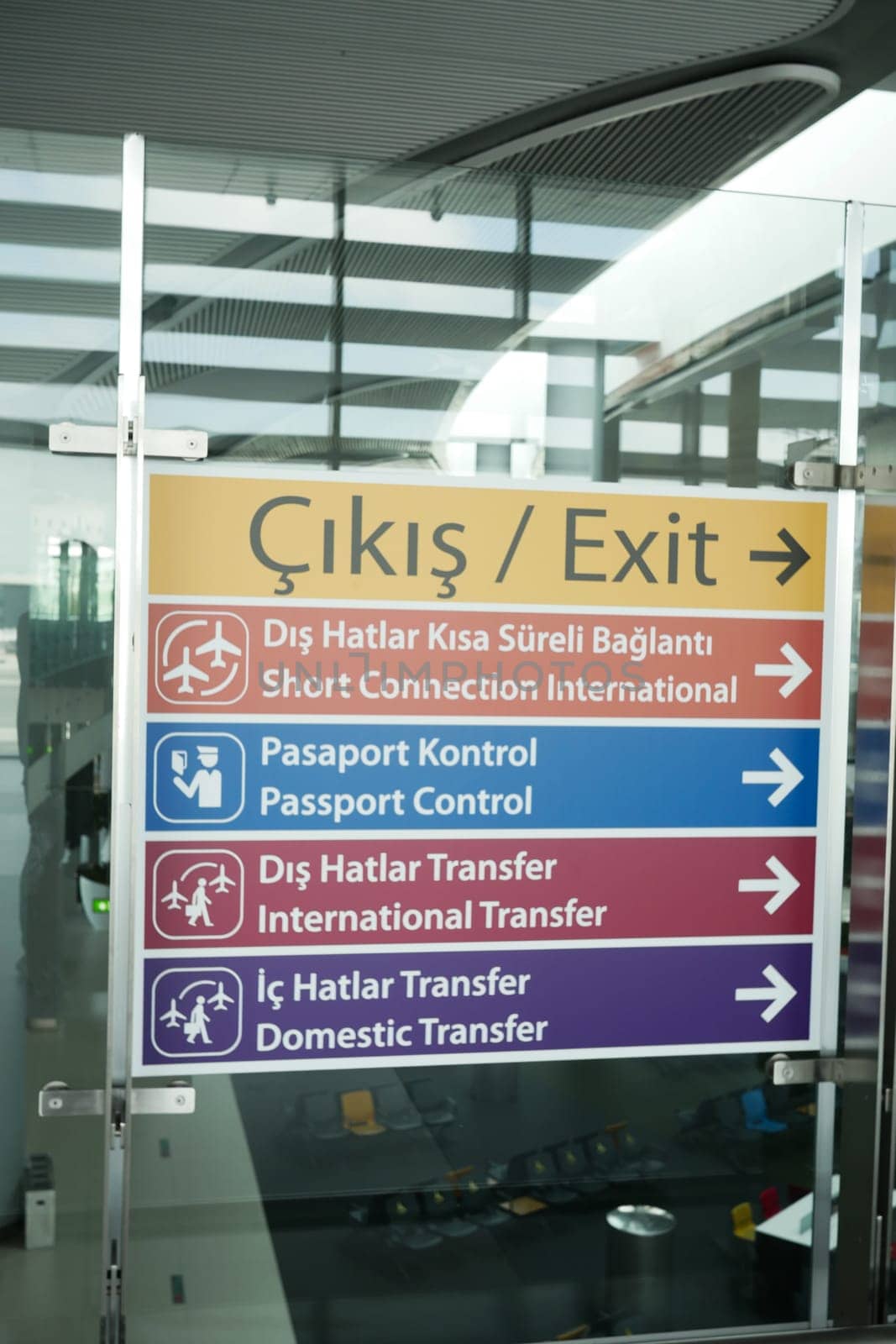 Signage provides directions for airport international and domestic transfers.