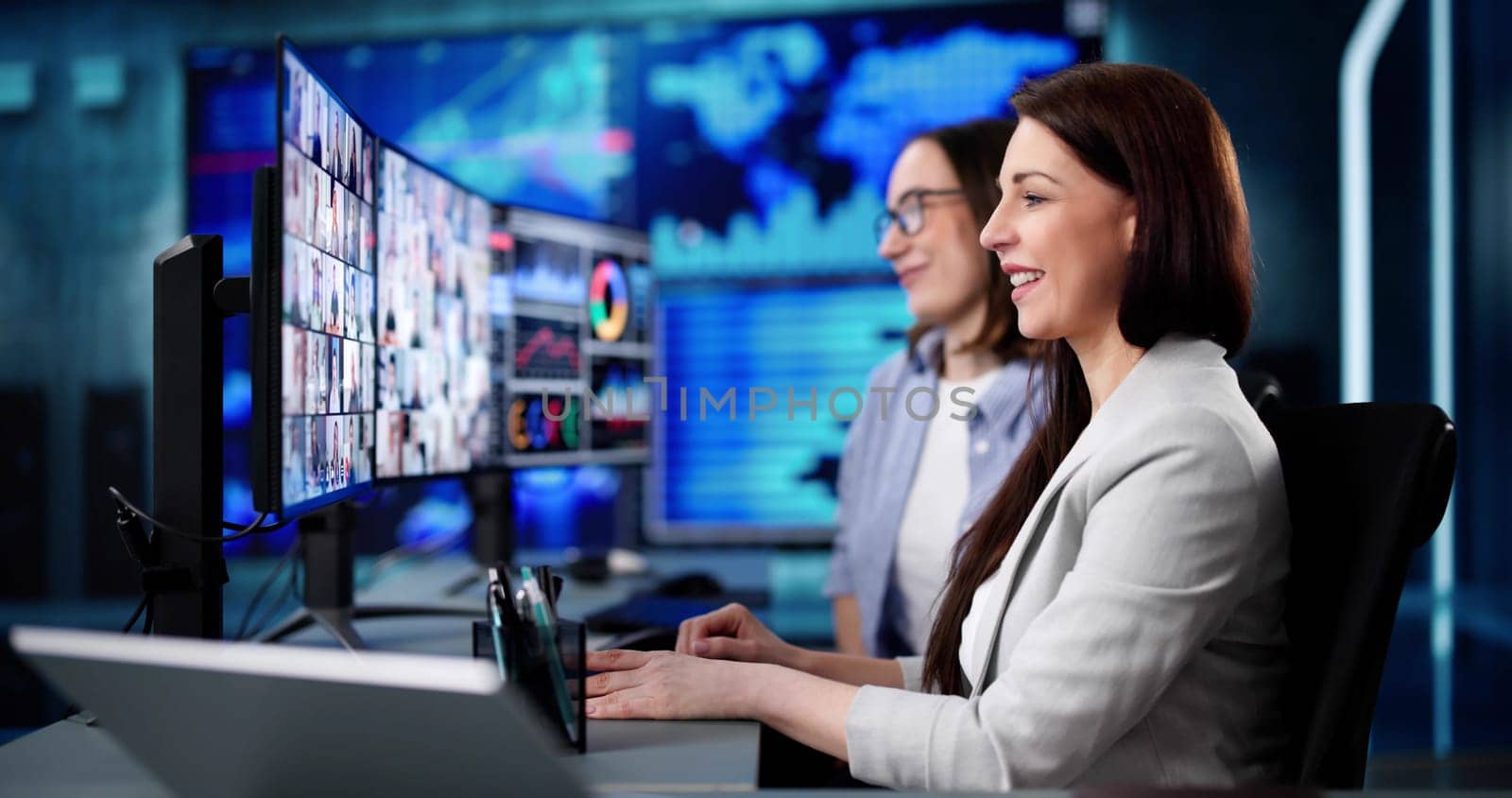 Young Caucasian woman managing virtual teams in online video conference.