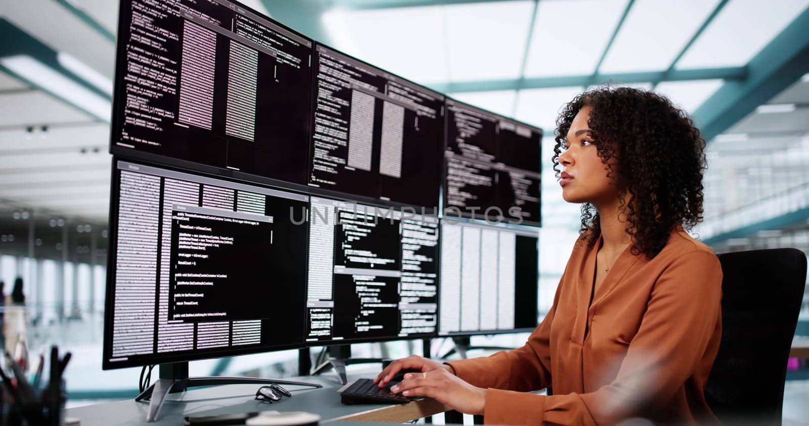 Coder Using Computer At Desk. Web Developer Lady